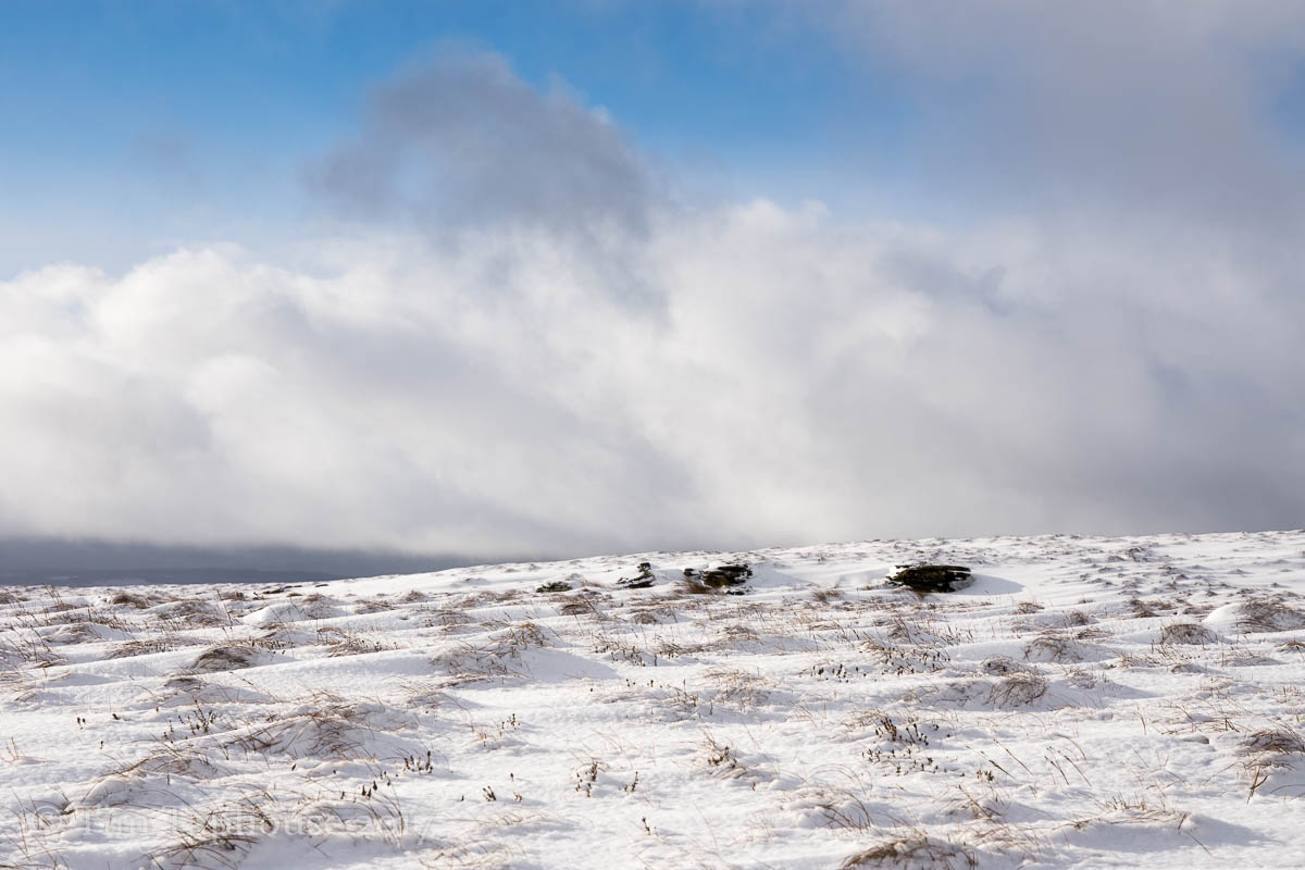 Snowy ground, cloudy skies in the Brecon Beacons
